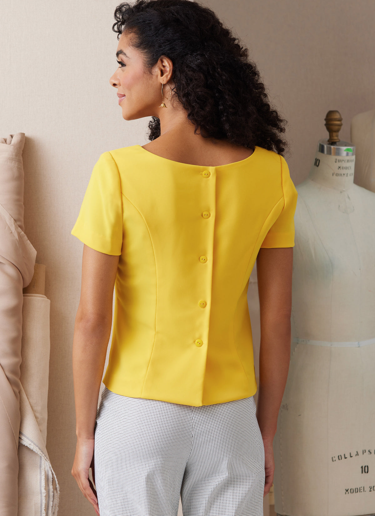 Butterick B6925 sewing pattern envelope showing the semi-fitted princess seam top designs