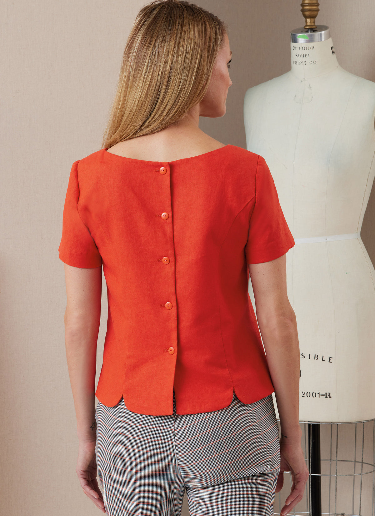 Butterick B6925 sewing pattern envelope showing the semi-fitted princess seam top designs
