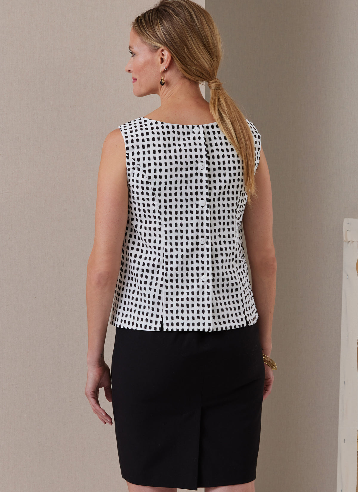 Butterick B6925 sewing pattern envelope showing the semi-fitted princess seam top designs