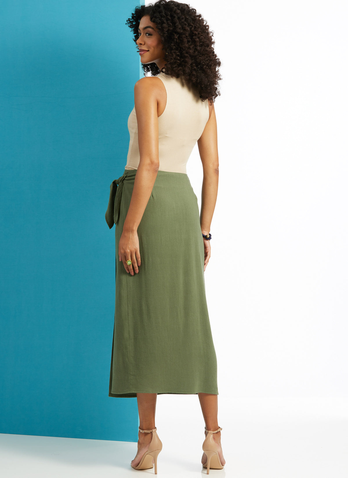 Butterick B6934 sewing pattern envelope showing the wrap skirt designs