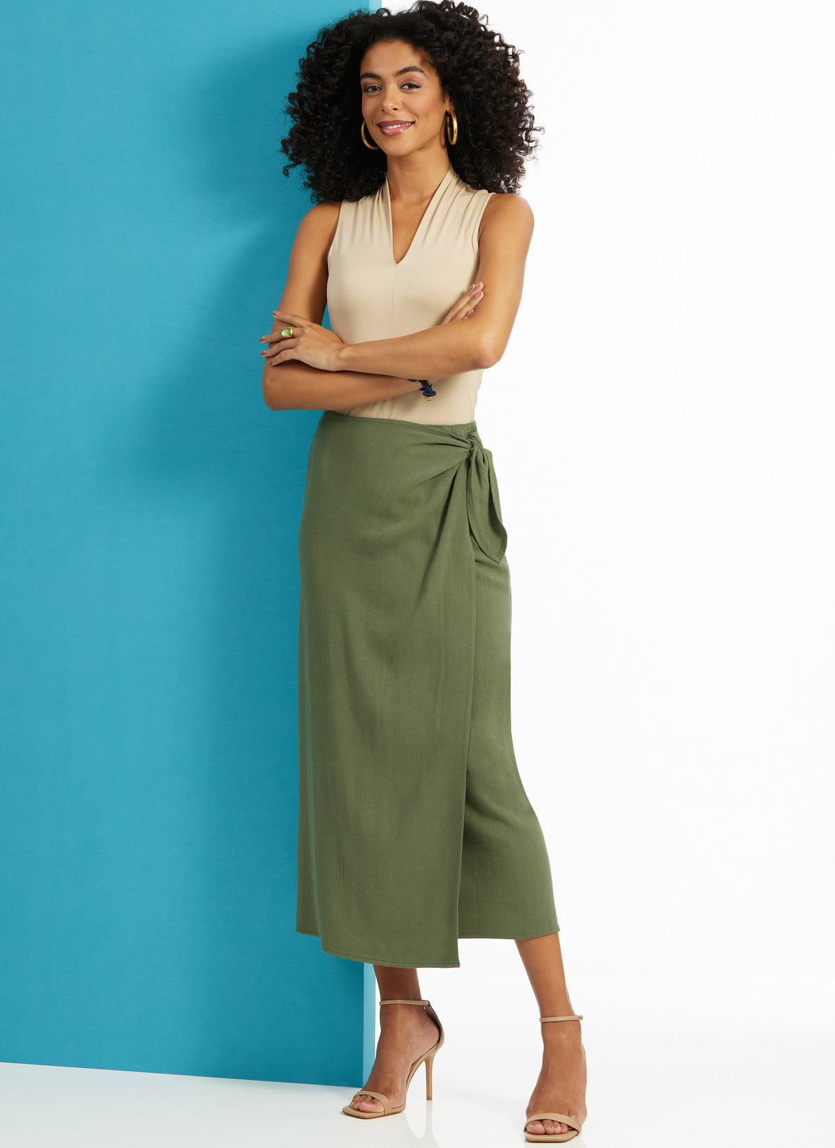 Butterick B6934 sewing pattern envelope showing the wrap skirt designs