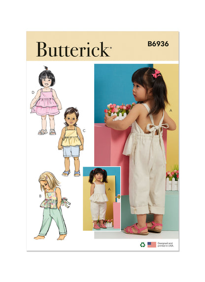 Butterick B6936 sewing pattern envelope showing the toddler overalls and dress designs