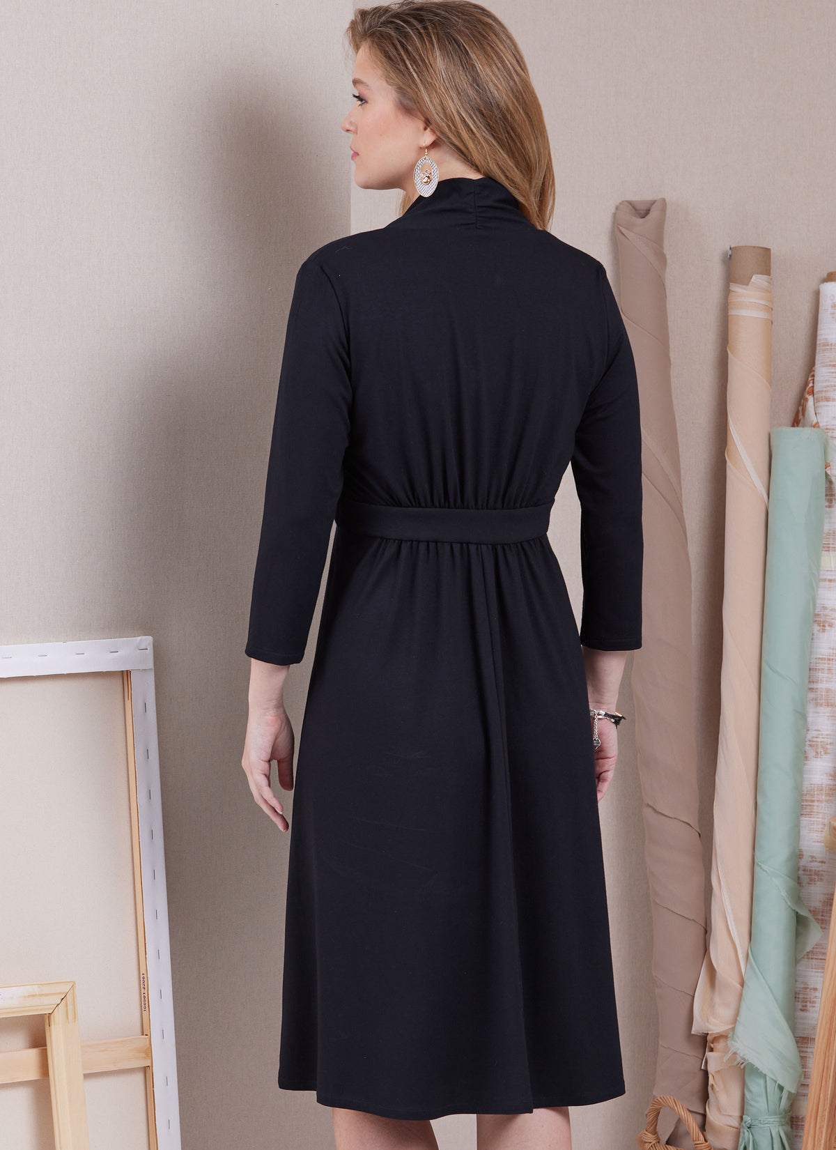 Butterick sewing pattern B6940 envelope showing a knit dress in three lengths