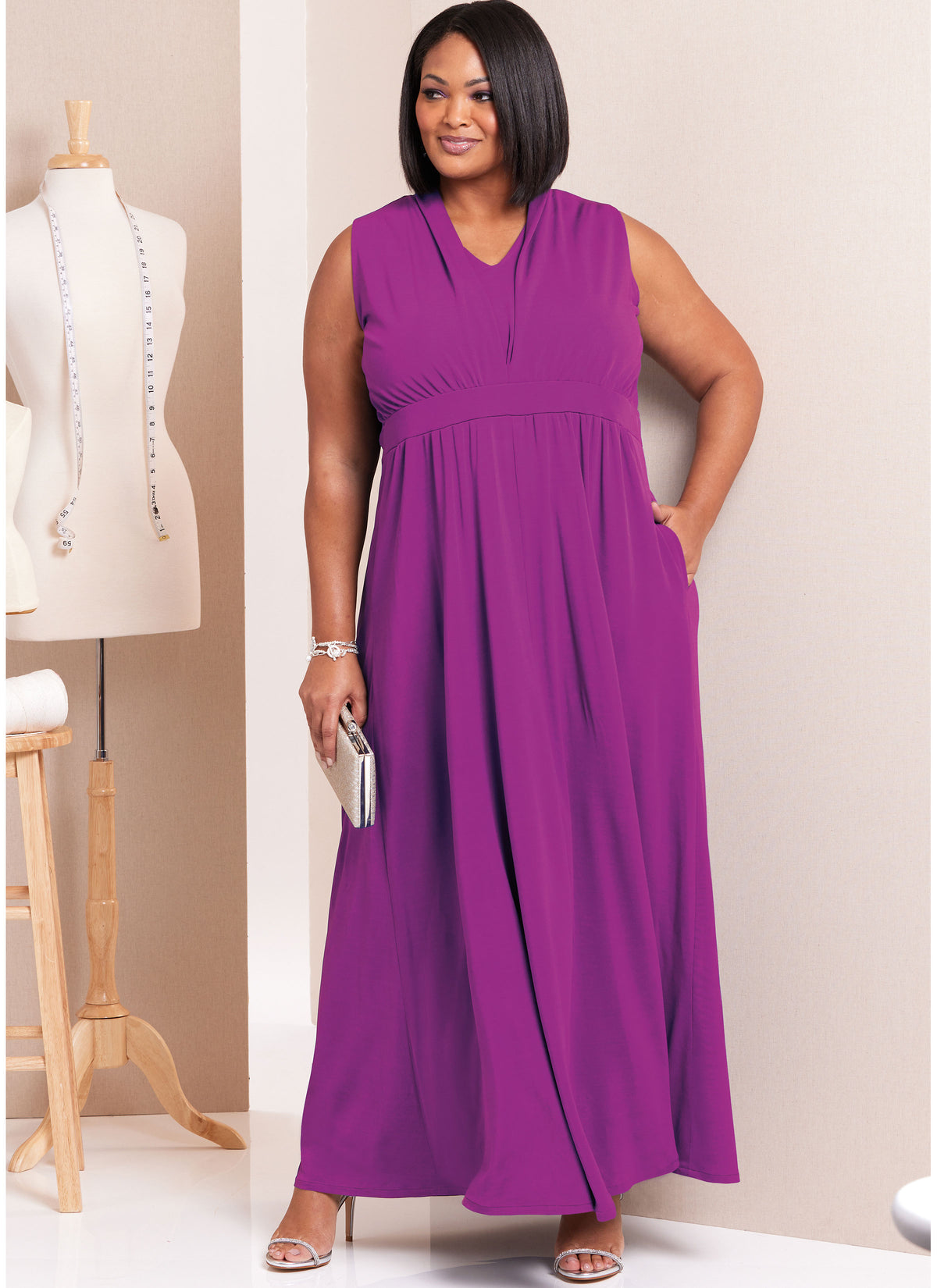 Butterick sewing pattern B6941 envelope showing a plus size knit dress in three lengths