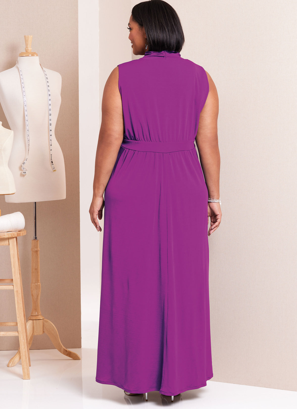 Butterick sewing pattern B6941 envelope showing a plus size knit dress in three lengths