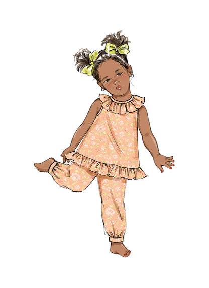Butterick sewing pattern B6951 envelope showing a toddler's dress and top