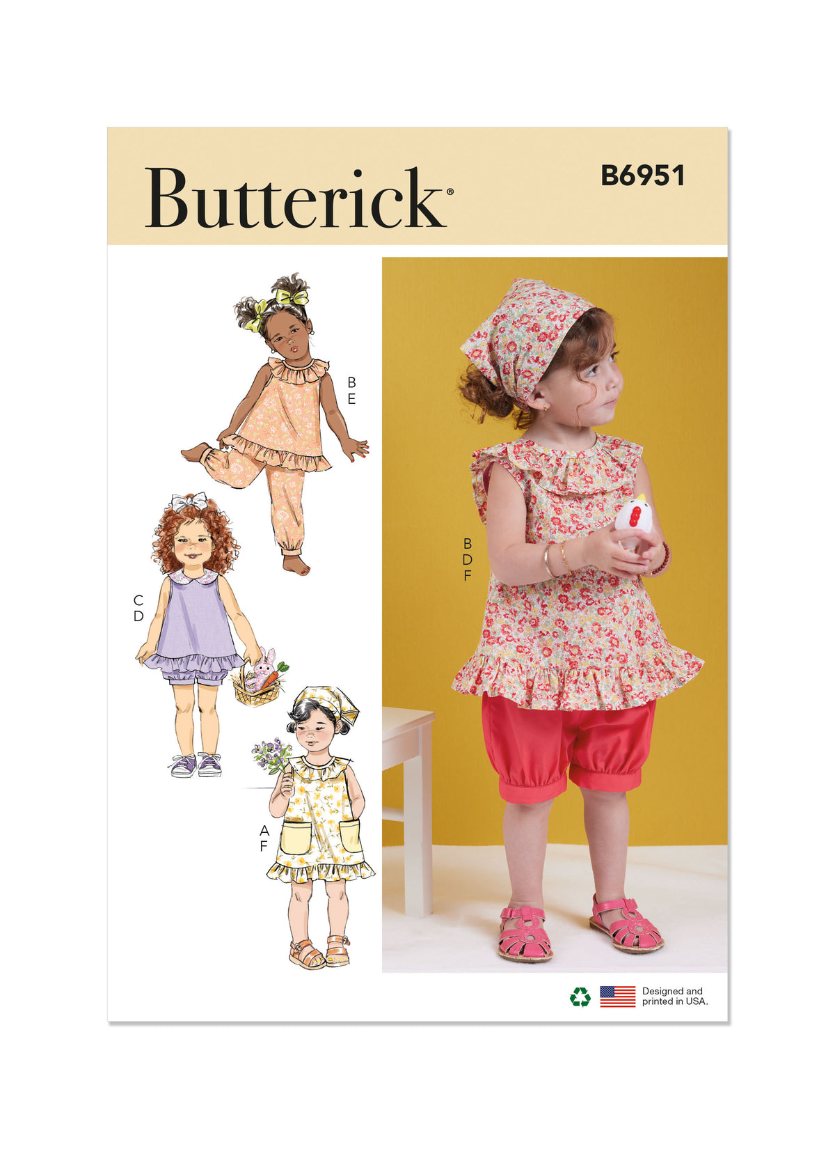 Butterick sewing pattern B6951 envelope showing a toddler's dress and top