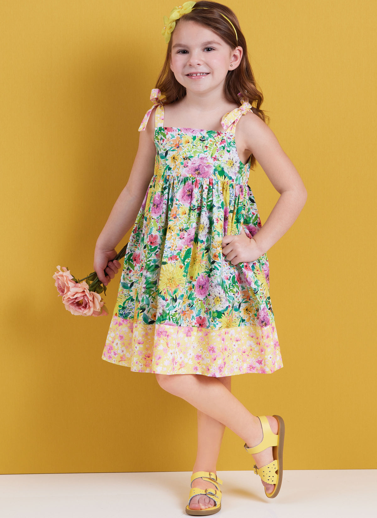 Butterick sewing pattern B6952 envelope showing a loose fitting pullover dress or top for children