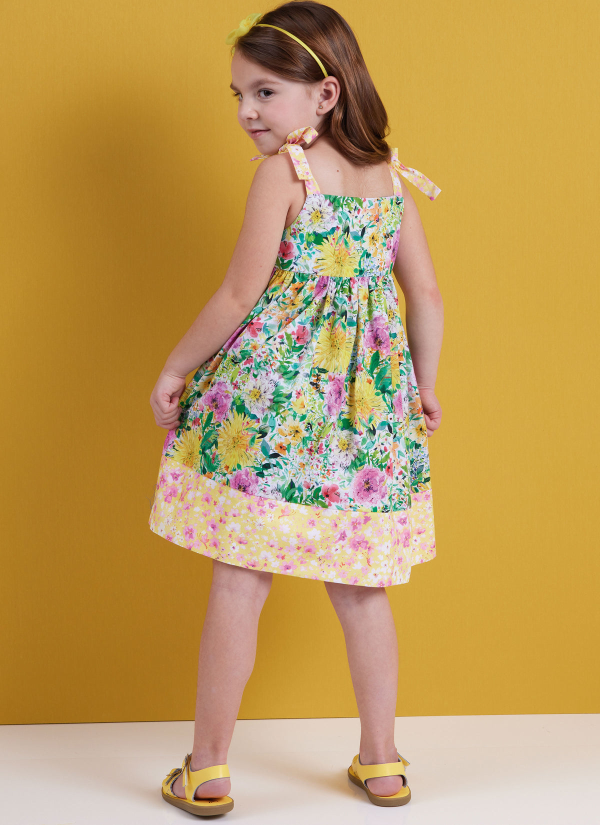 Butterick sewing pattern B6952 envelope showing a loose fitting pullover dress or top for children