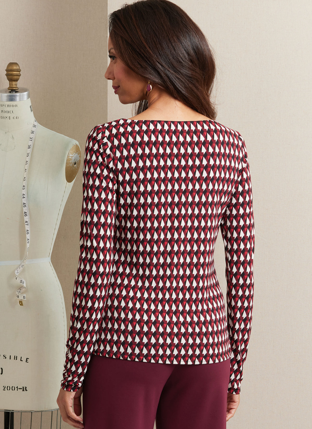 Butterick B6966 sewing pattern envelope showing close-fitting pullover tops