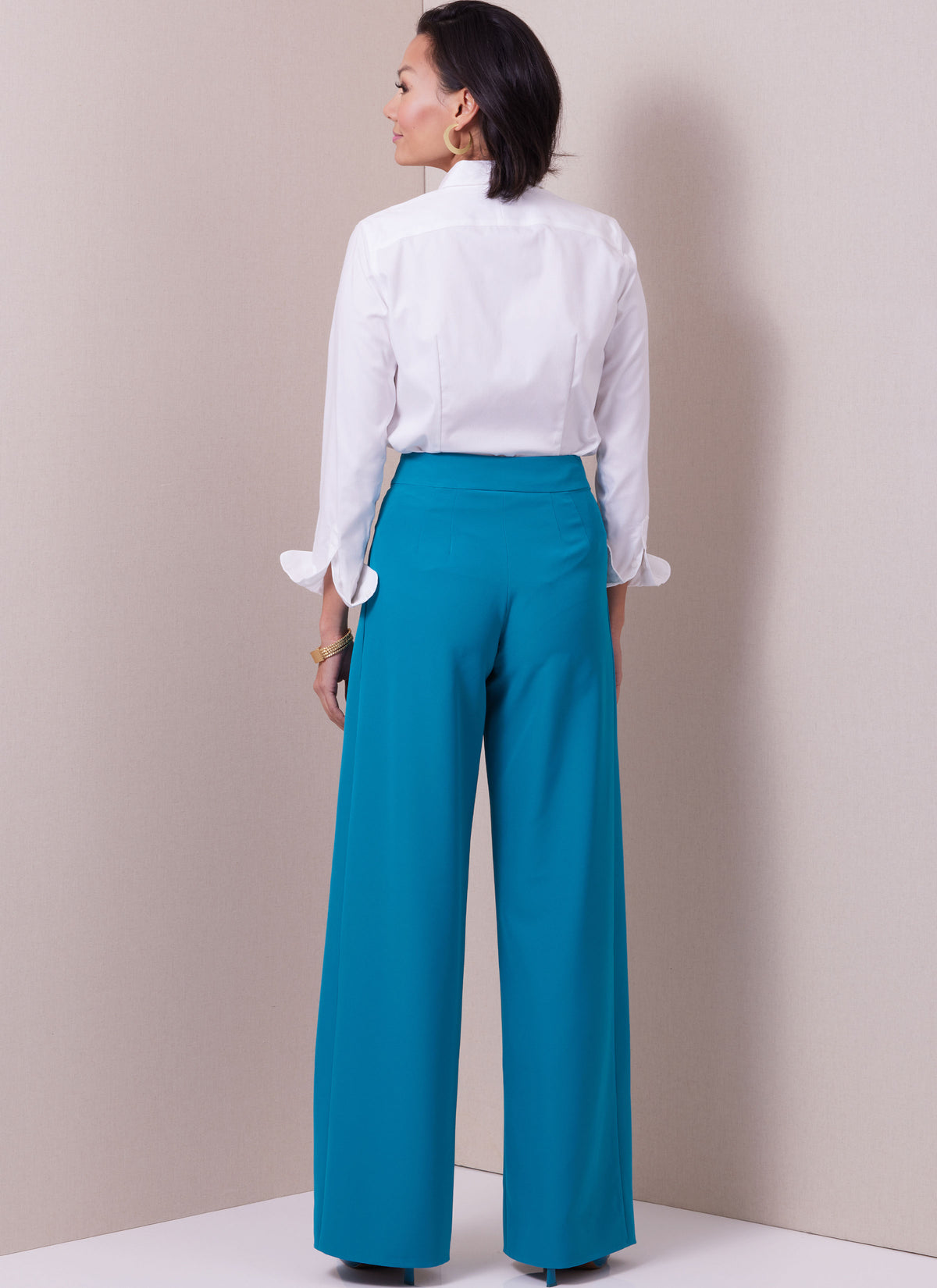 Butterick B6973 sewing pattern envelope showing wide leg and cropped trousers