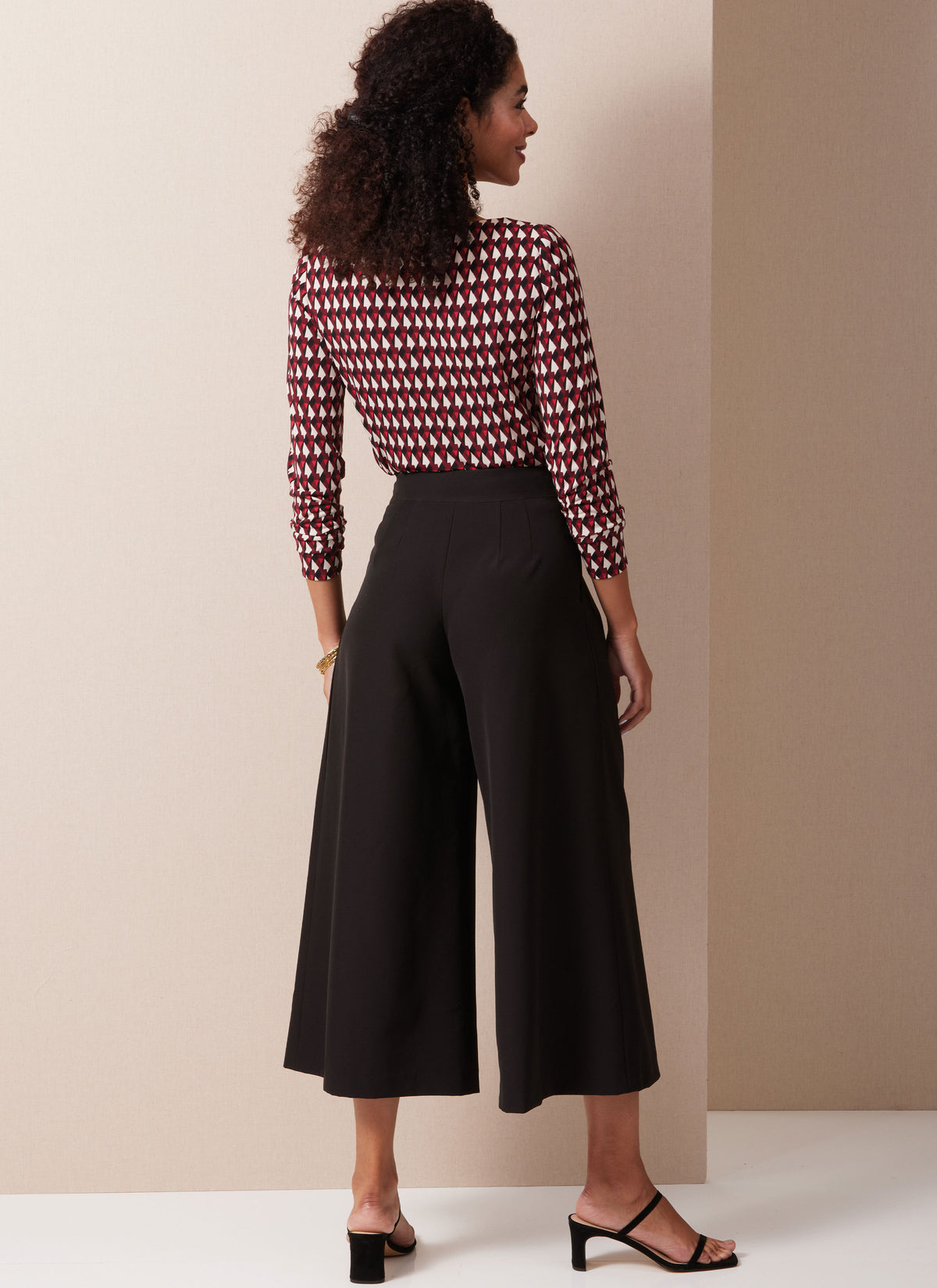 Butterick B6973 sewing pattern envelope showing wide leg and cropped trousers