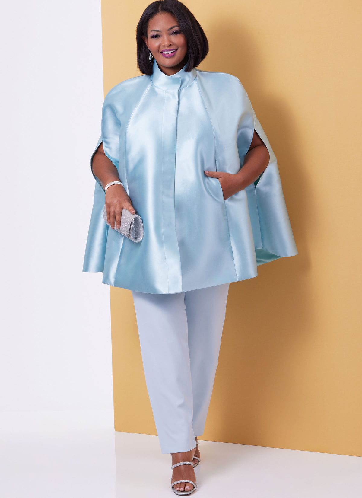 Butterick B6978 sewing pattern envelope showing lined capes