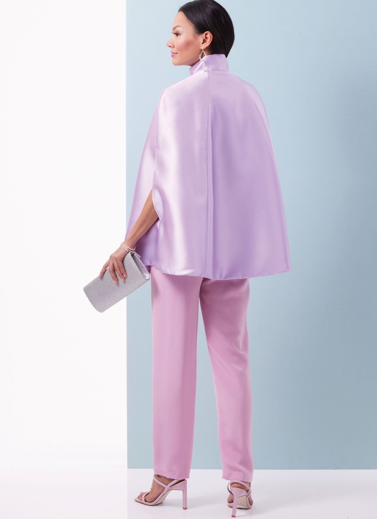 Butterick B6978 sewing pattern envelope showing lined capes