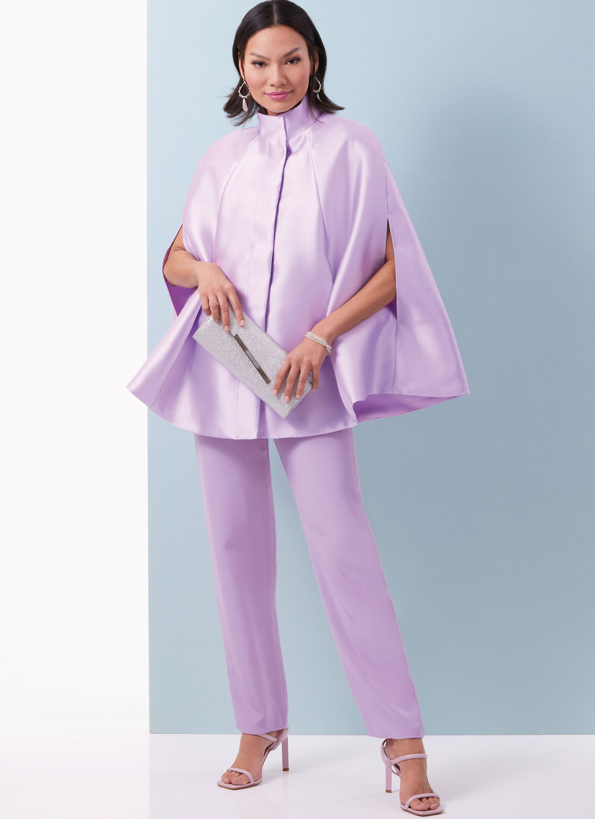Butterick B6978 sewing pattern envelope showing lined capes