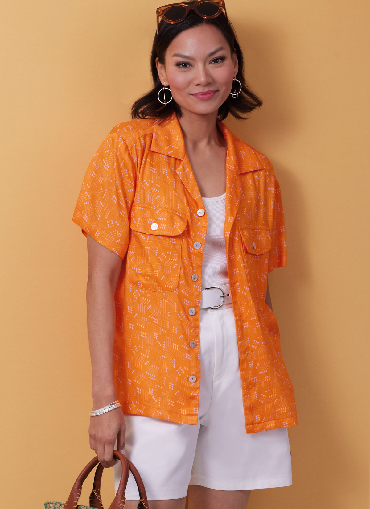 Butterick B6984 sewing pattern envelope showing a loose-fitting camp collar shirt