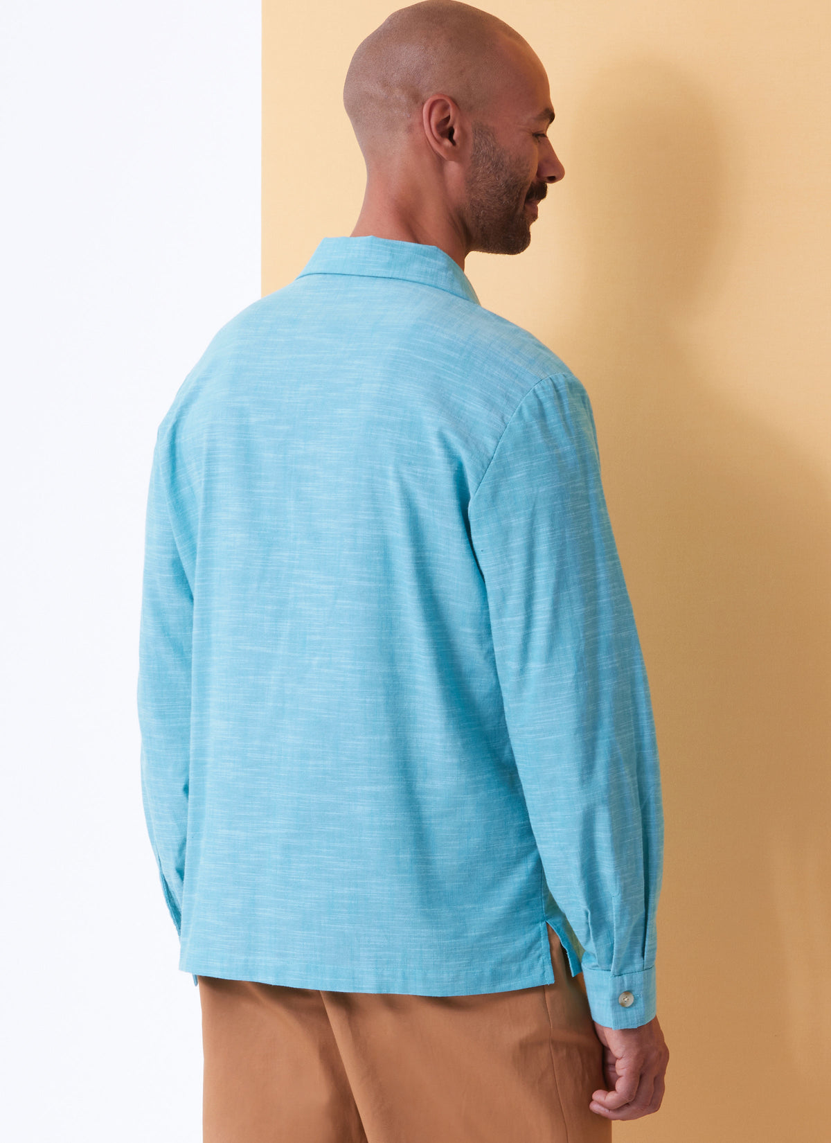 Butterick B6984 sewing pattern envelope showing a loose-fitting camp collar shirt