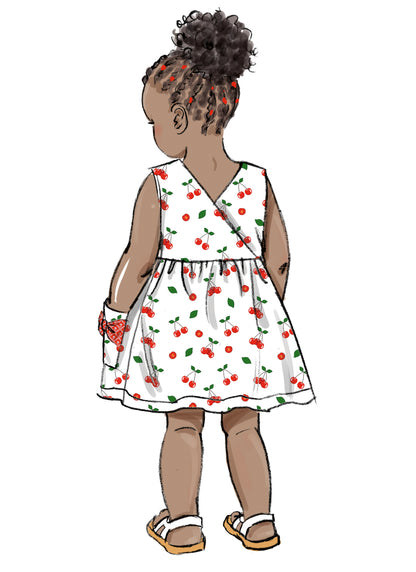 Butterick B6987 sewing pattern envelope showing toddler dresses and rompers
