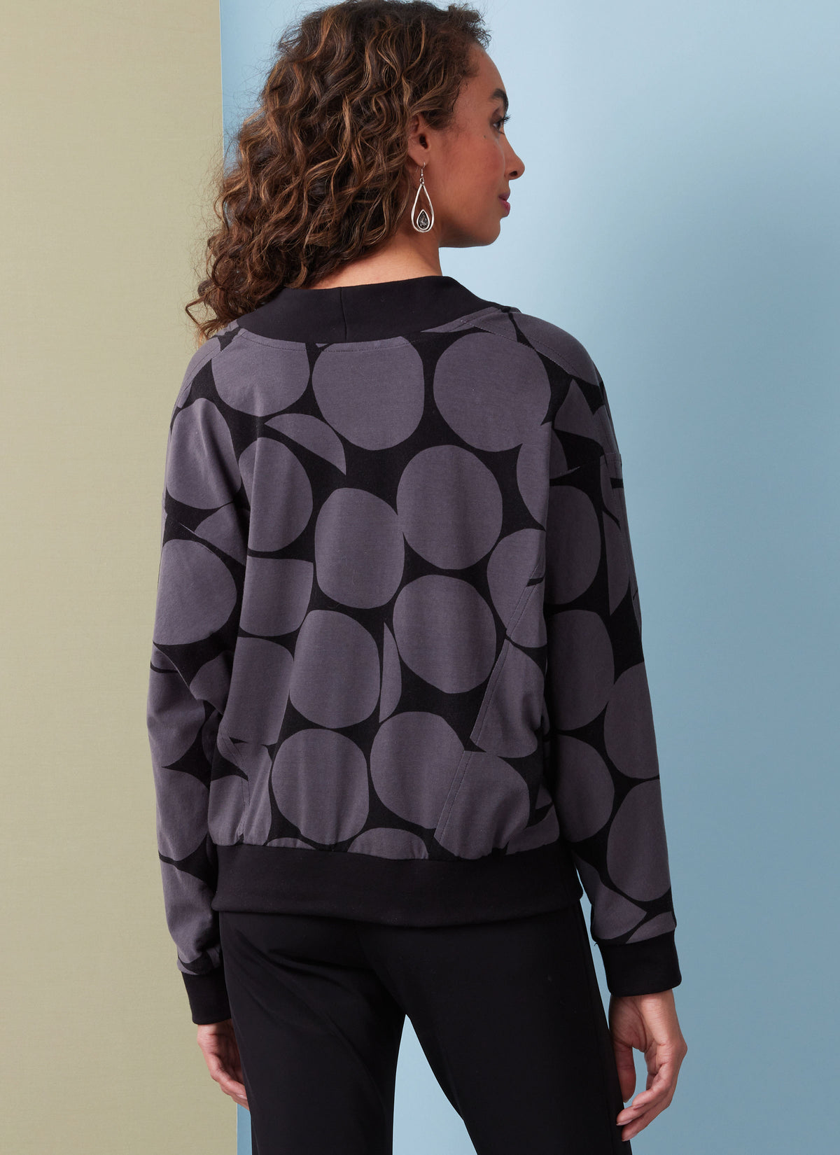 Butterick B6996 sewing pattern envelope showing crossover top designs