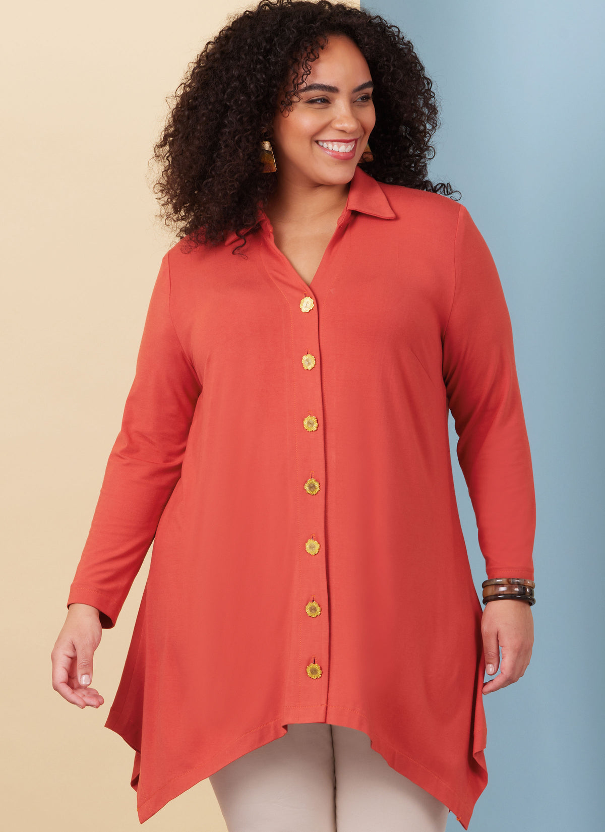 Butterick B6997 sewing pattern envelope showing knit shirt designs