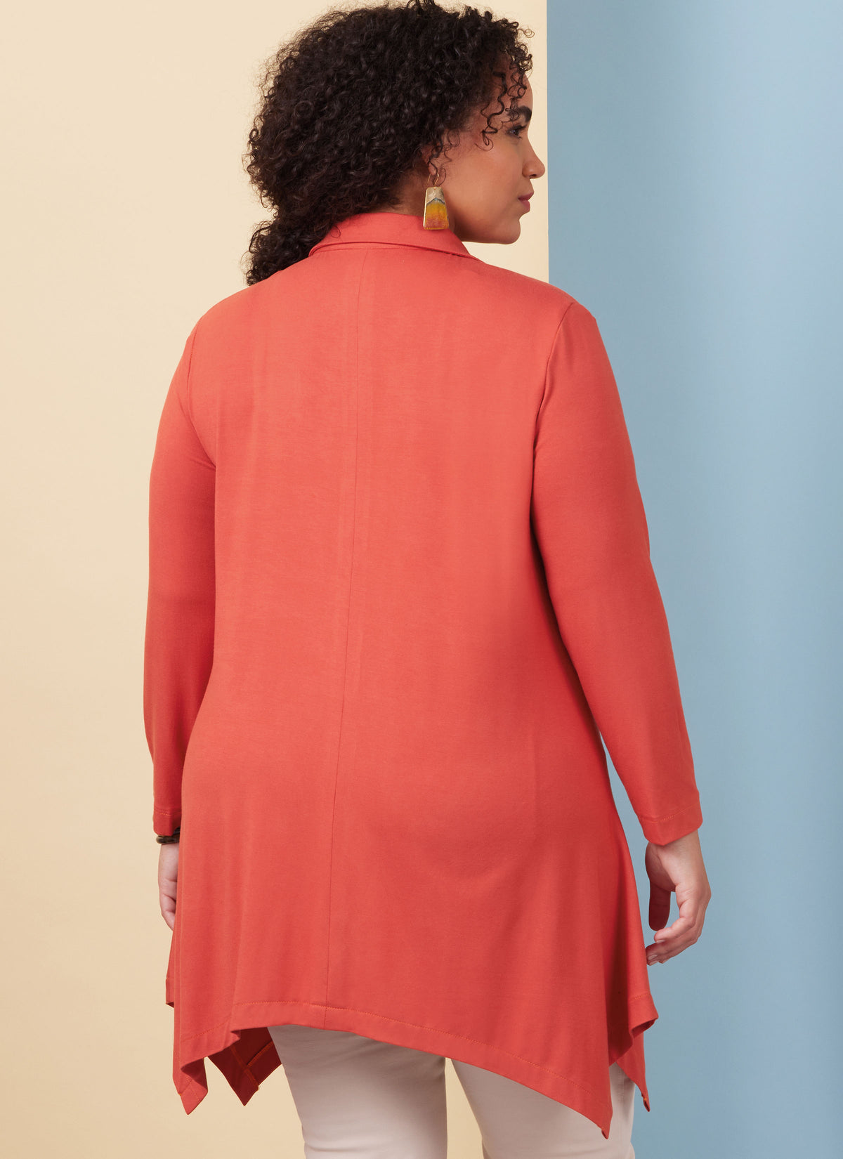 Butterick B6997 sewing pattern envelope showing knit shirt designs