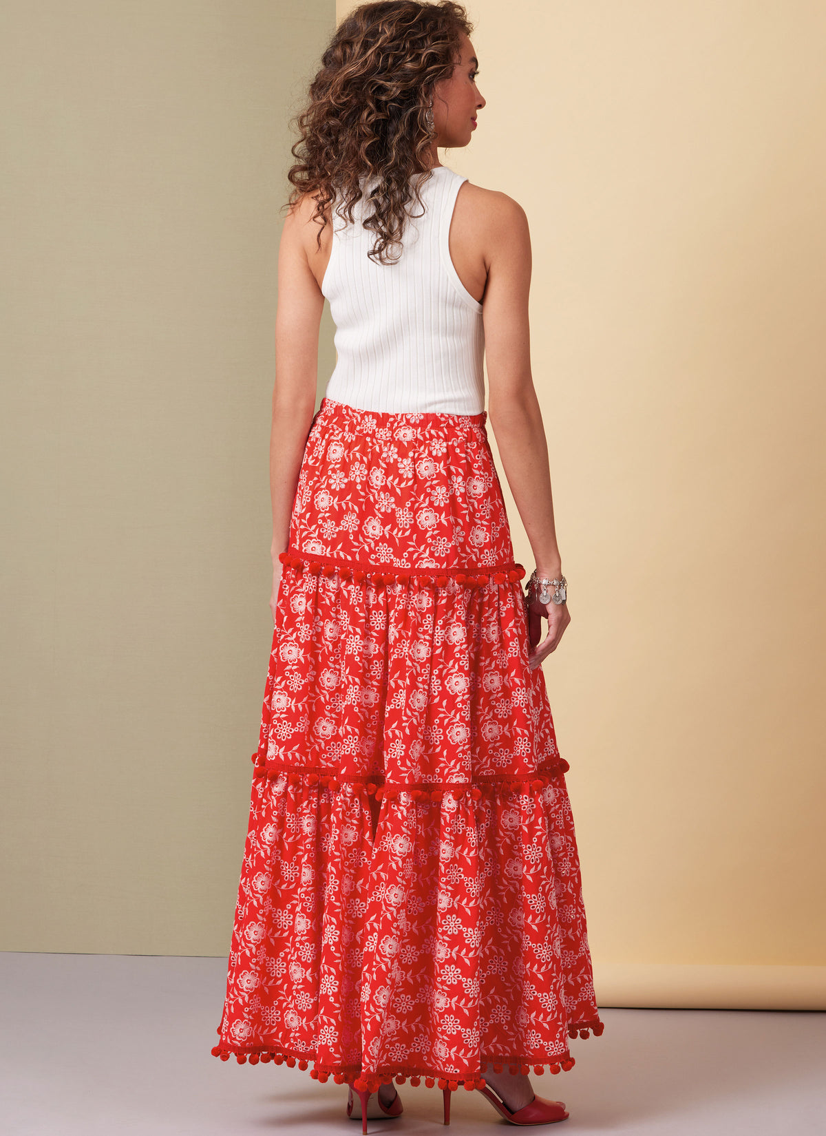 Butterick B6999 sewing pattern envelope showing tiered skirt designs