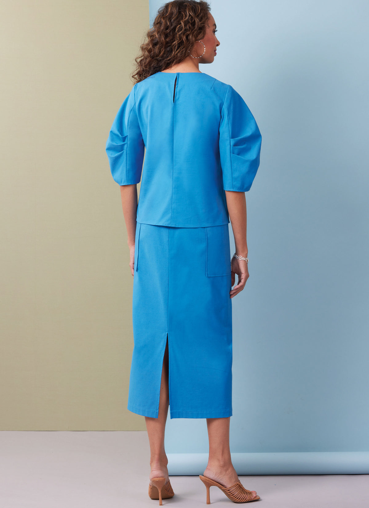 Butterick B7002 sewing pattern envelope showing puff sleeve top designs