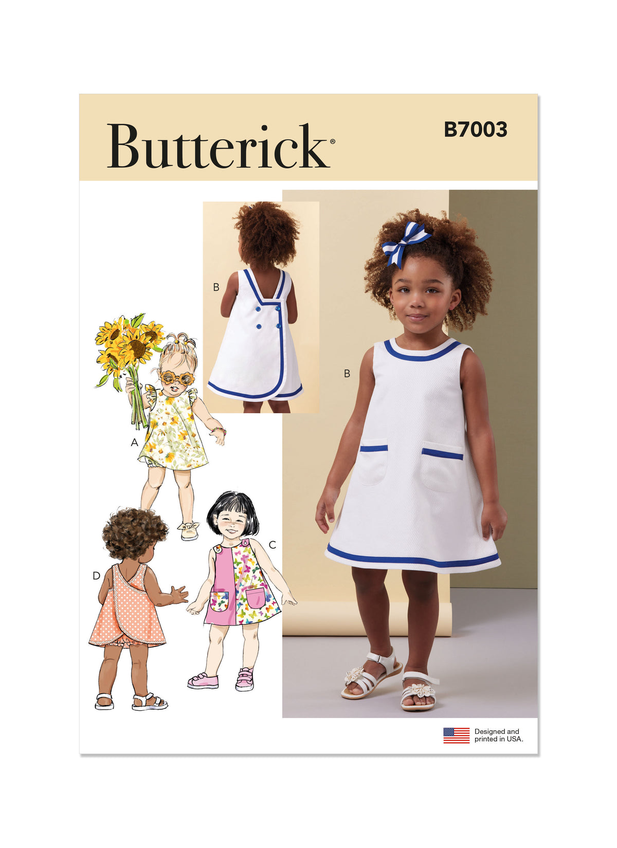 Butterick B7003 sewing pattern envelope showing toddler dress designs