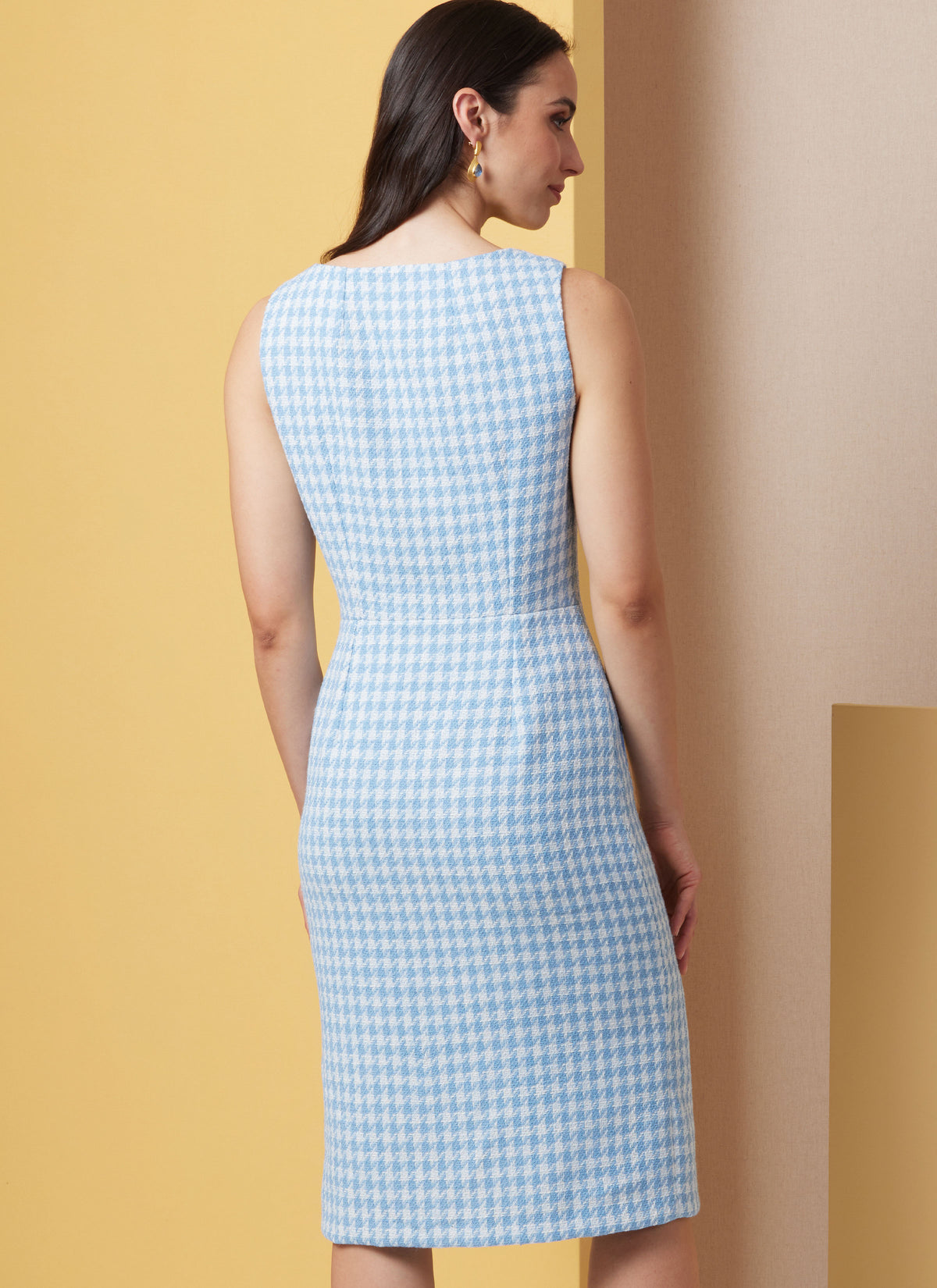 Butterick B7022 sewing pattern envelope showing women's sleeveless dress designs
