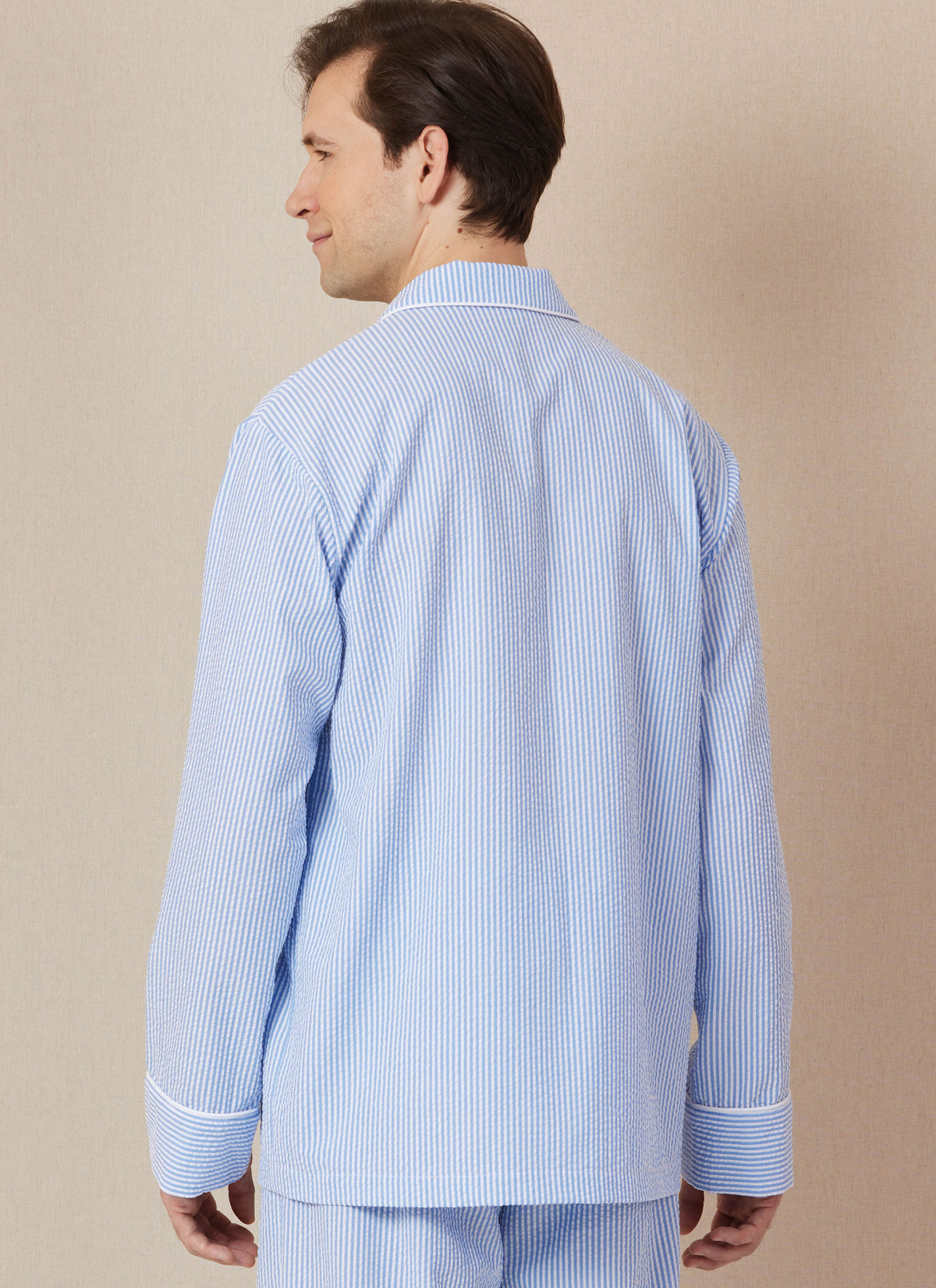 Butterick B7030 sewing pattern envelope showing unisex pyjama shirt designs