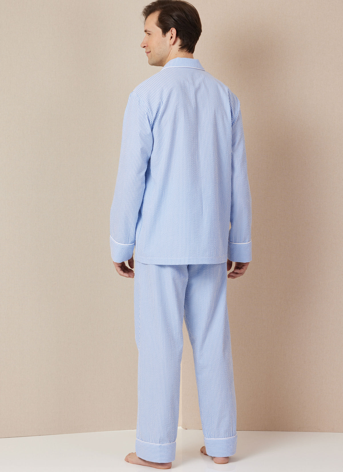 Butterick B7030 sewing pattern envelope showing unisex pyjama shirt designs