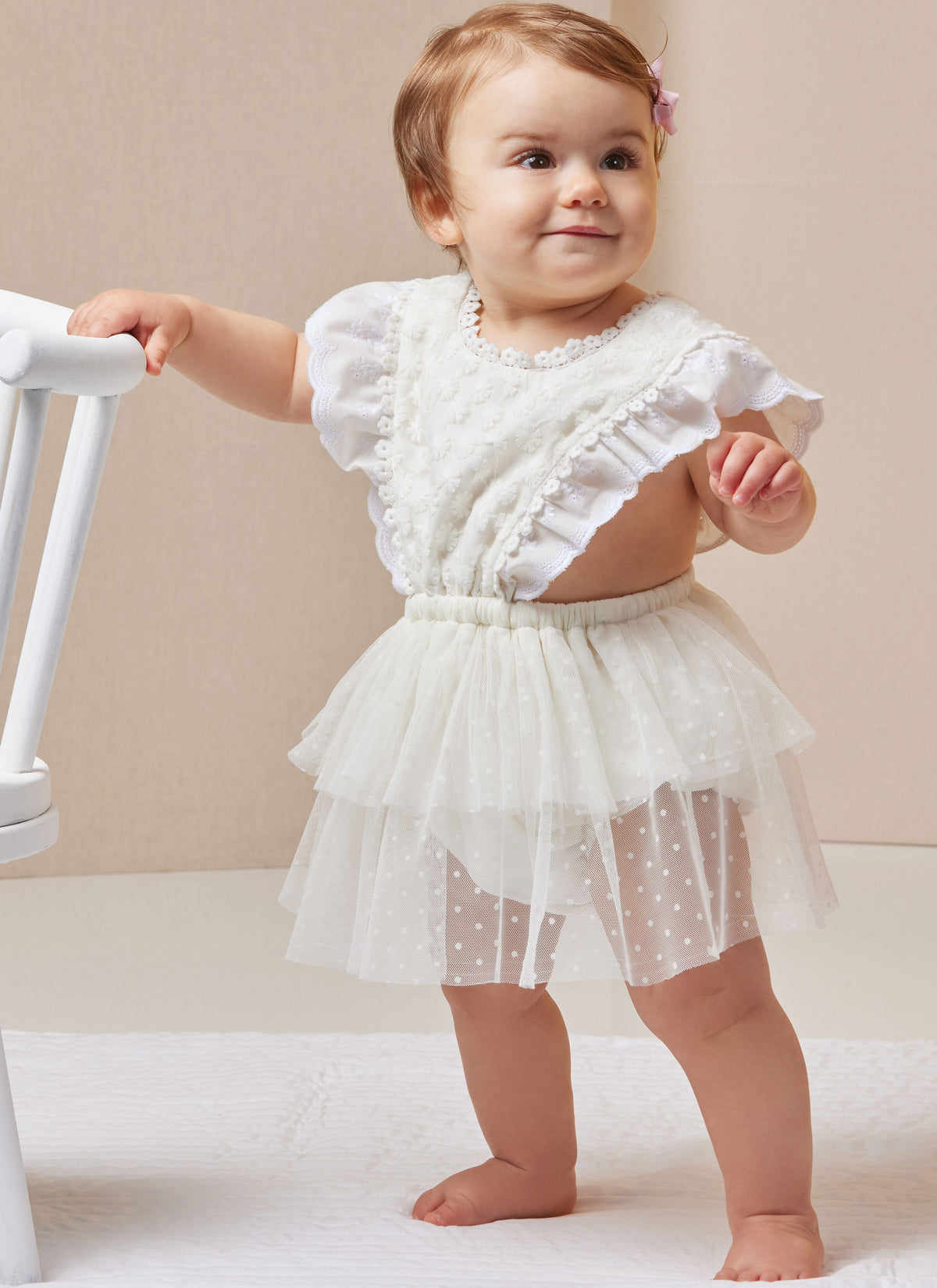 Butterick B7031 sewing pattern envelope showing baby romper designs