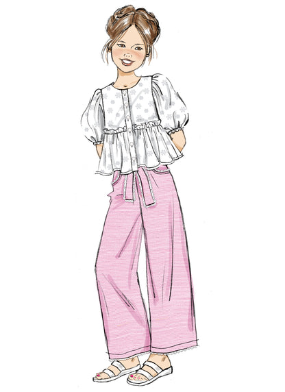 Butterick B7034 sewing pattern envelope showing girls' top designs