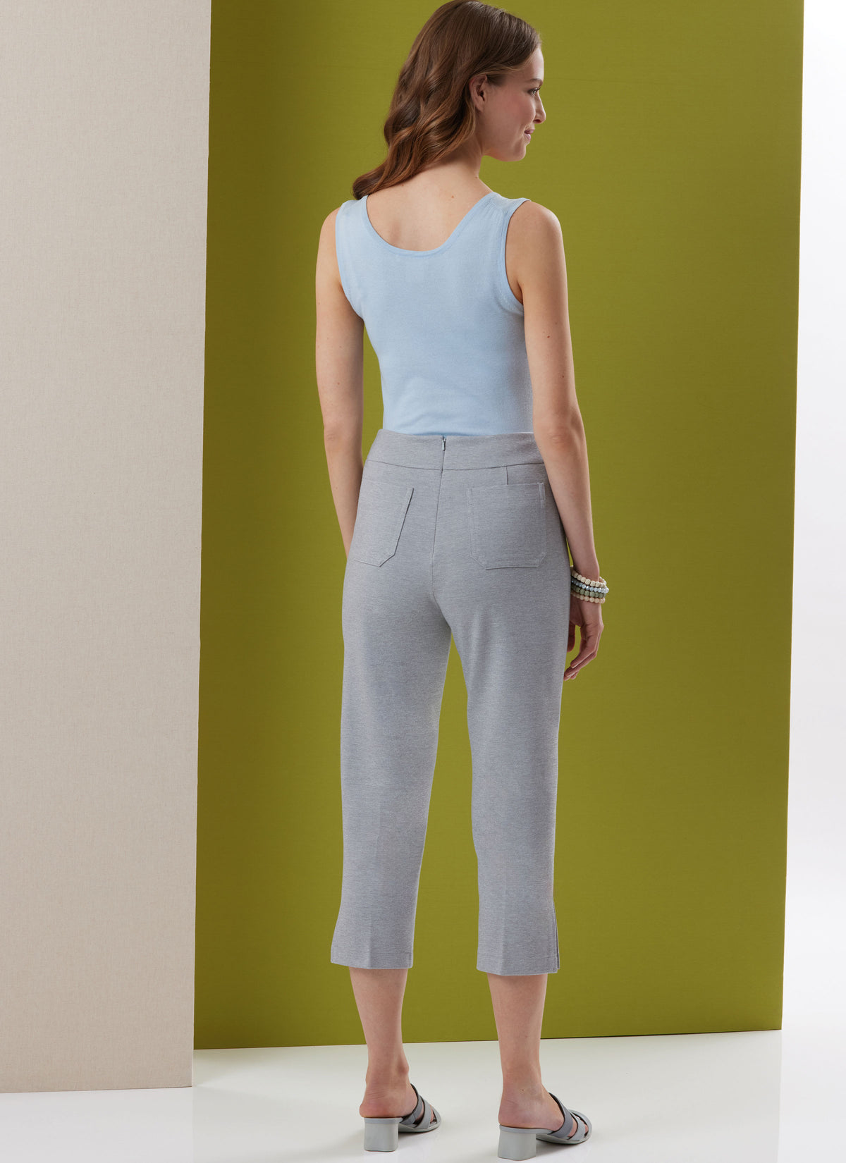 Butterick B7042 sewing pattern envelope showing fitted trousers designs