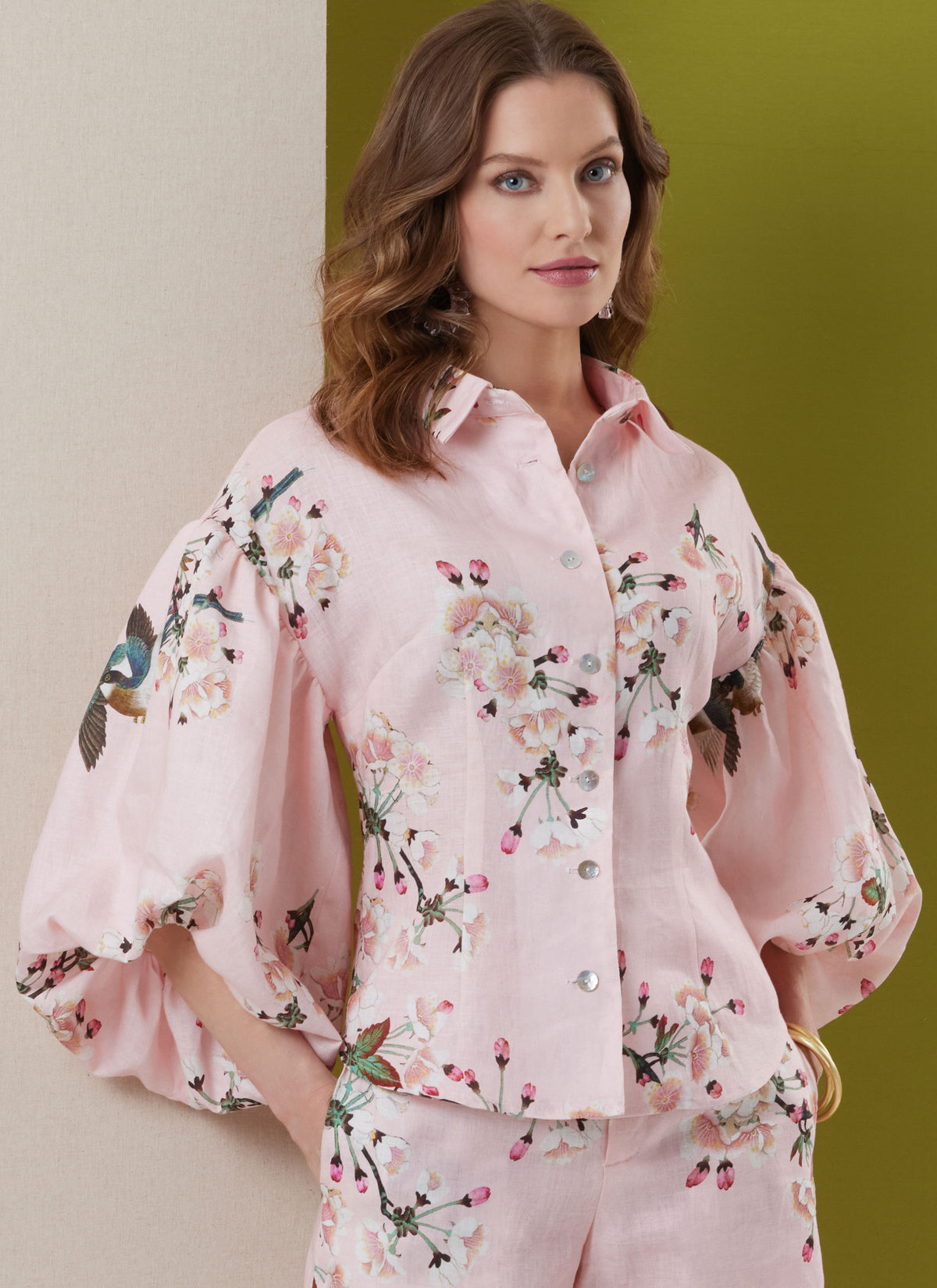 Butterick B7045 sewing pattern envelope showing button-front top designs