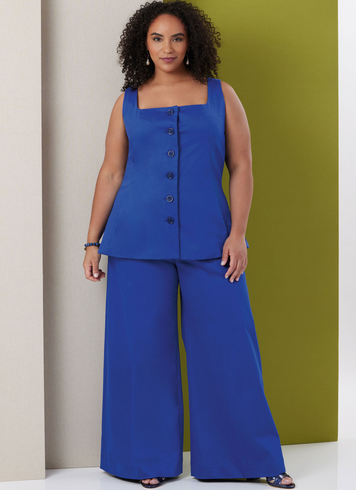Butterick B7046 sewing pattern envelope showing sleeveless lined top designs