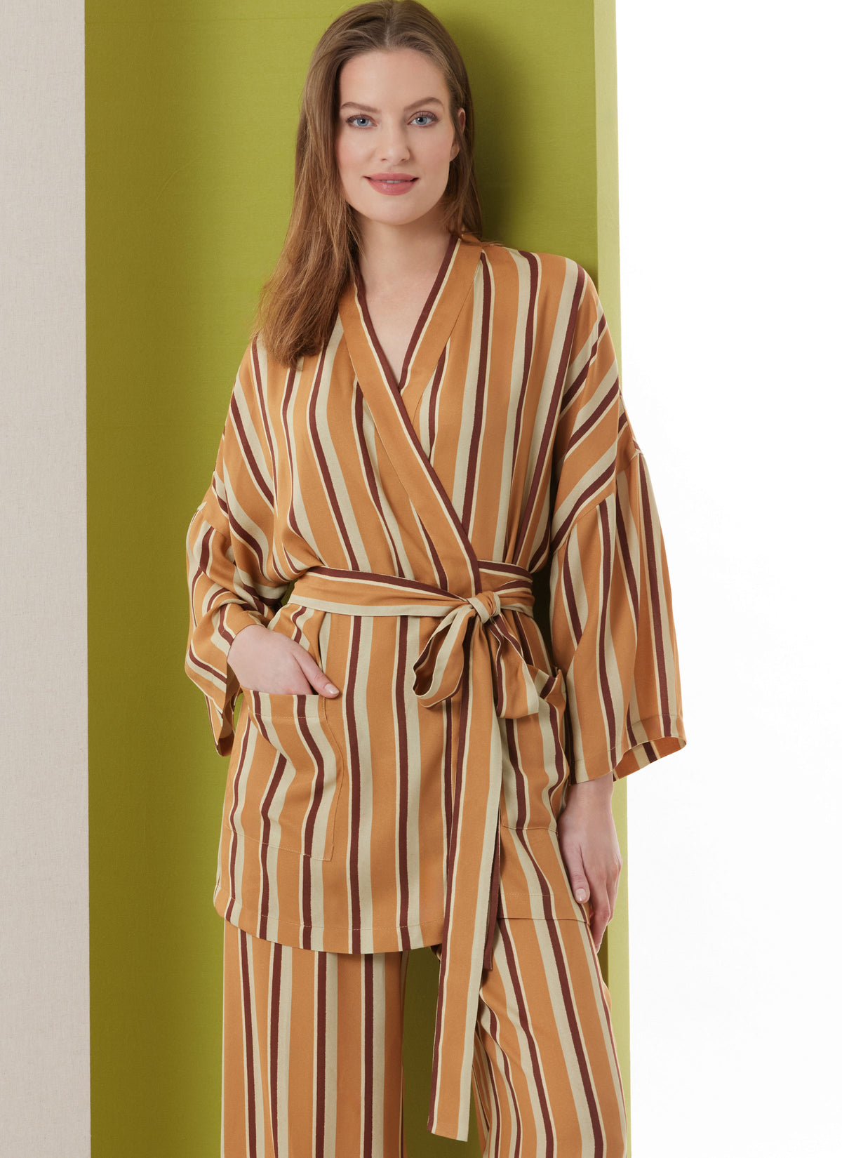 Butterick B7047 sewing pattern envelope showing loose-fit robe designs