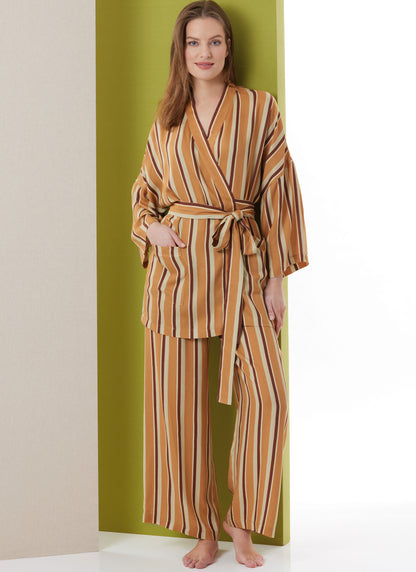 Butterick B7047 sewing pattern envelope showing loose-fit robe designs