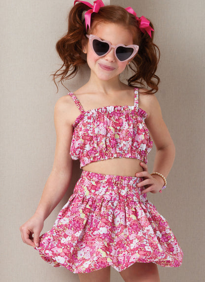 Butterick B7050 sewing pattern envelope showing children's ruffle top designs