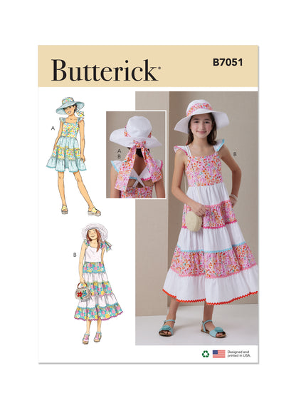 Butterick B7051 sewing pattern envelope showing girls' tiered dress designs