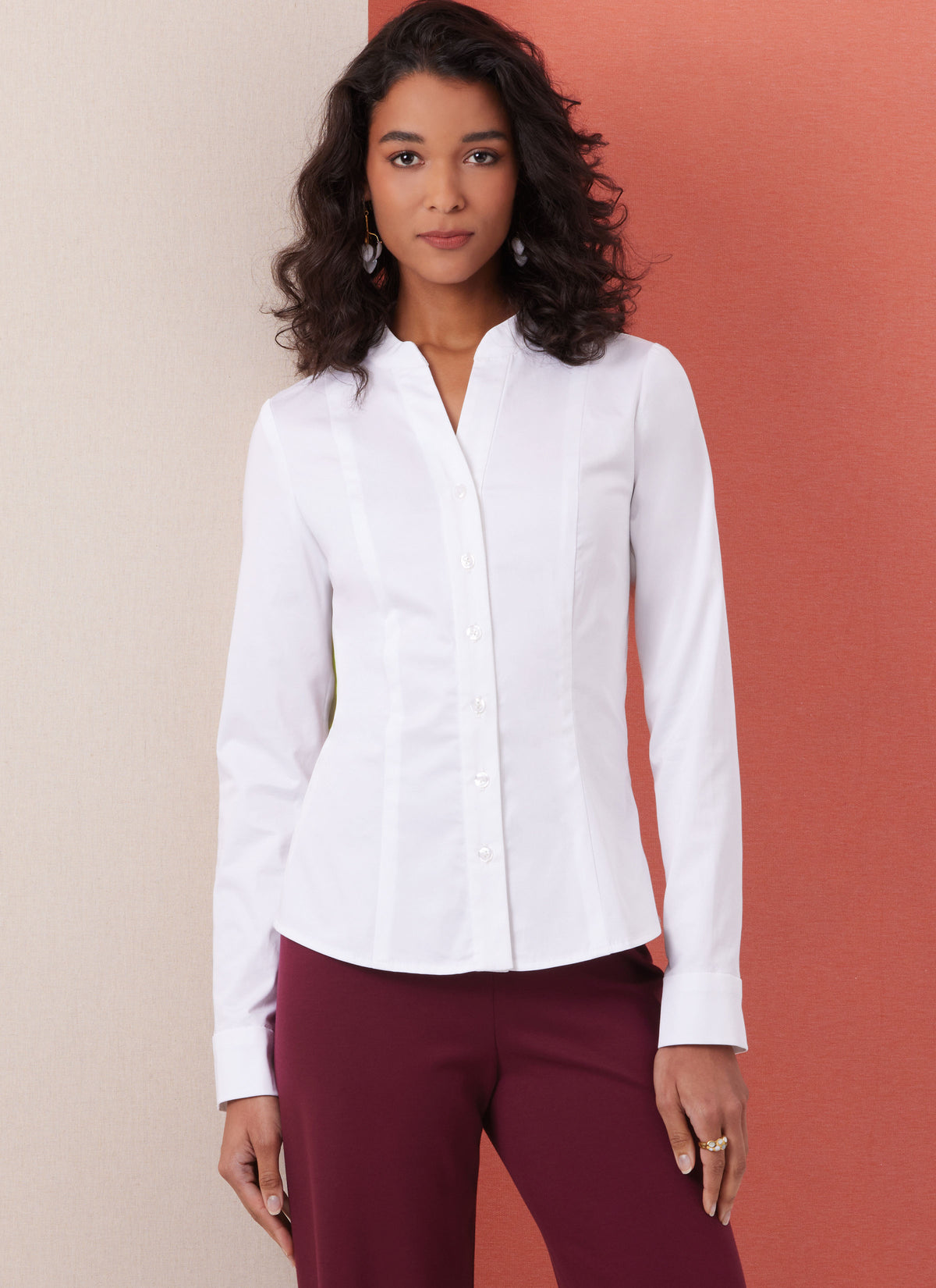 Butterick B7055 sewing pattern envelope showing fitted button-front shirt designs
