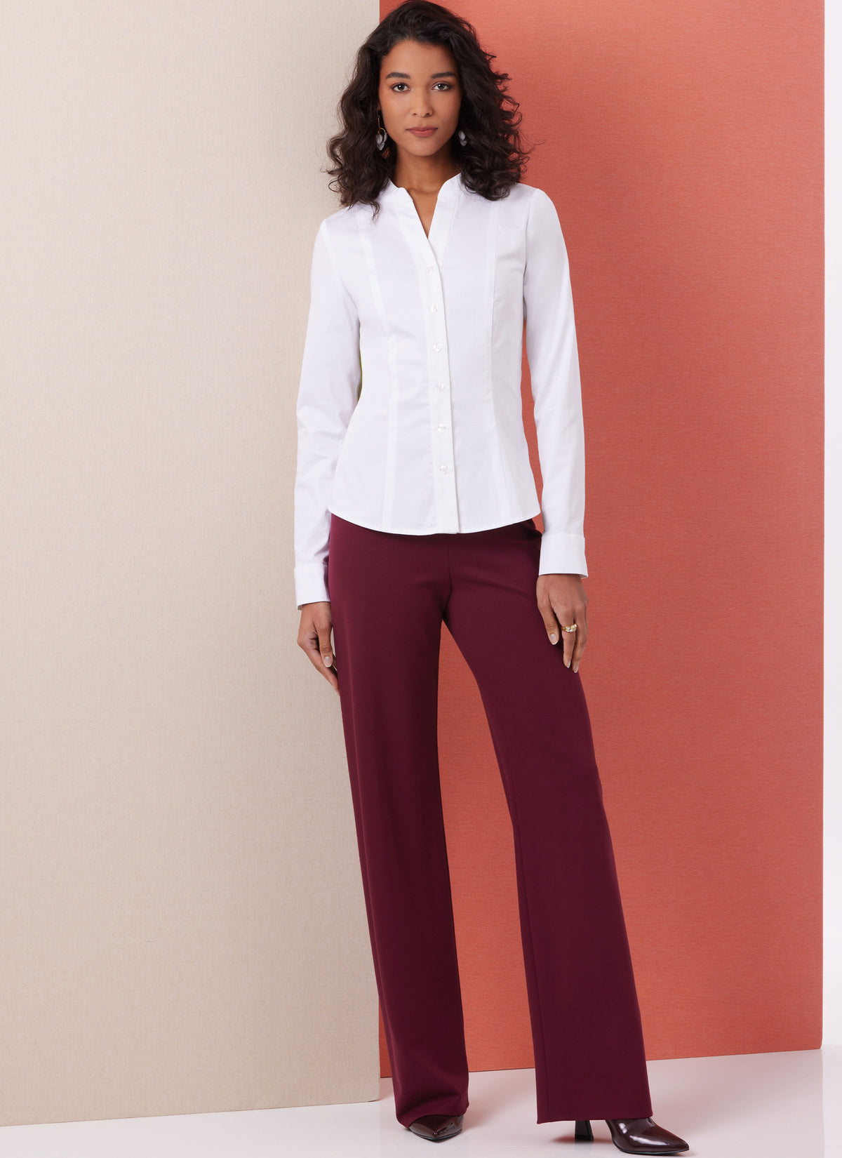 Butterick B7055 sewing pattern envelope showing fitted button-front shirt designs