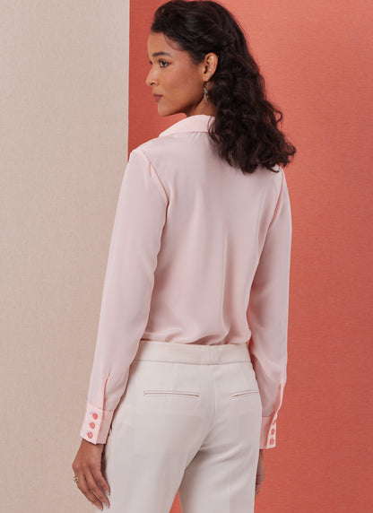 Butterick B7056 sewing pattern envelope showing cowl neck blouse designs