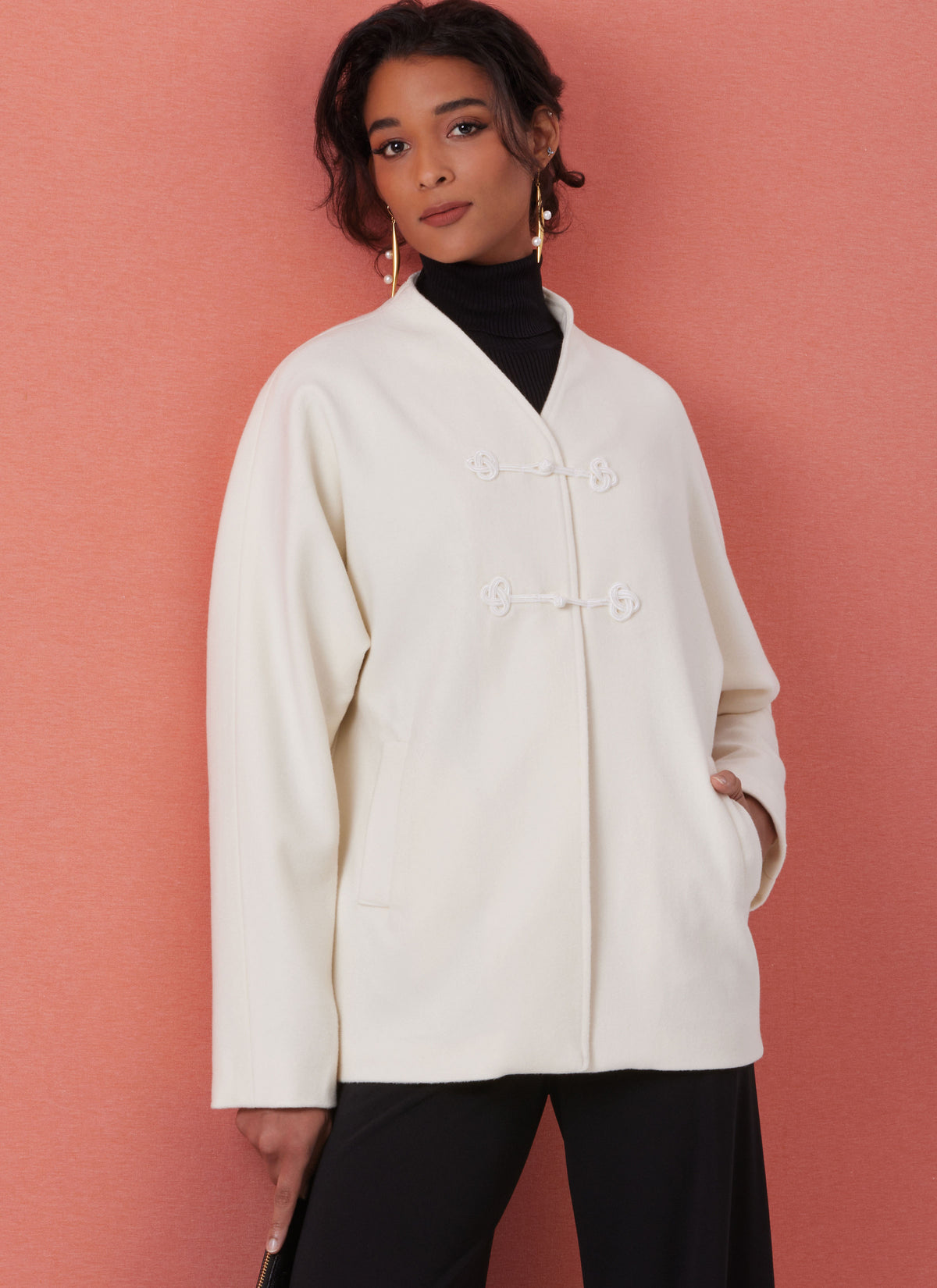 Butterick B7058 sewing pattern envelope showing loose-fit jacket designs