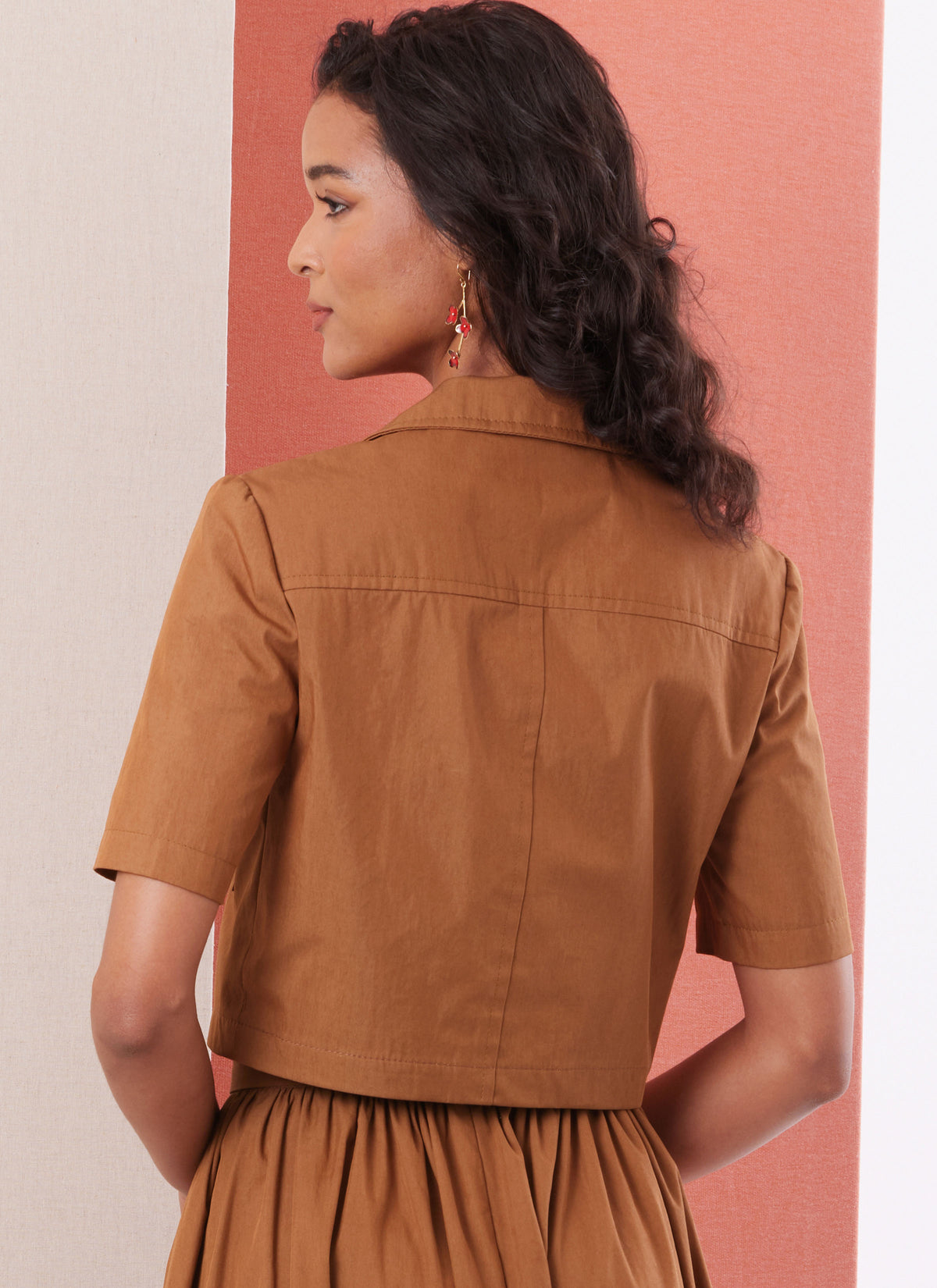 Butterick B7061 sewing pattern envelope showing waist-length jacket designs