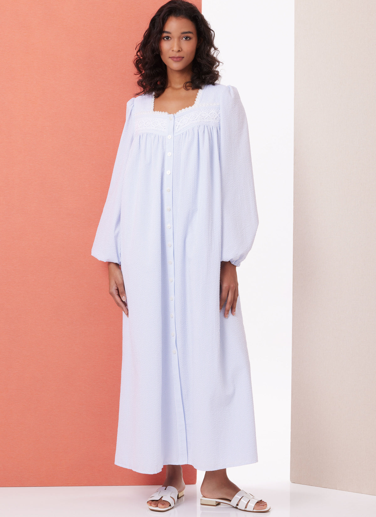 Butterick B7062 sewing pattern envelope showing button-front robe designs