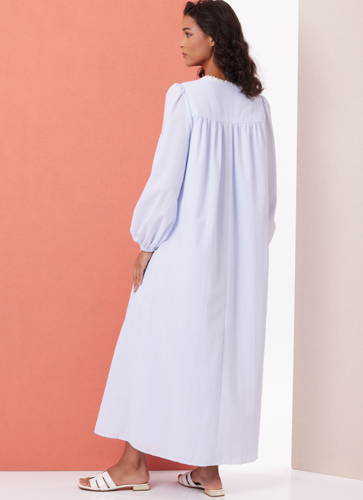 Butterick B7062 sewing pattern envelope showing button-front robe designs