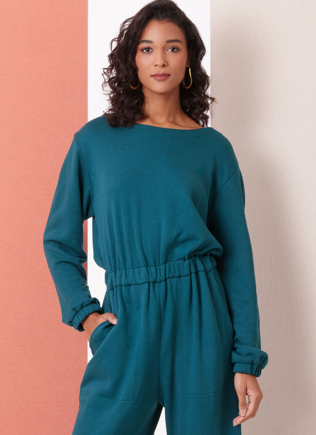 Butterick B7063 sewing pattern envelope showing open back knit jumpsuit designs