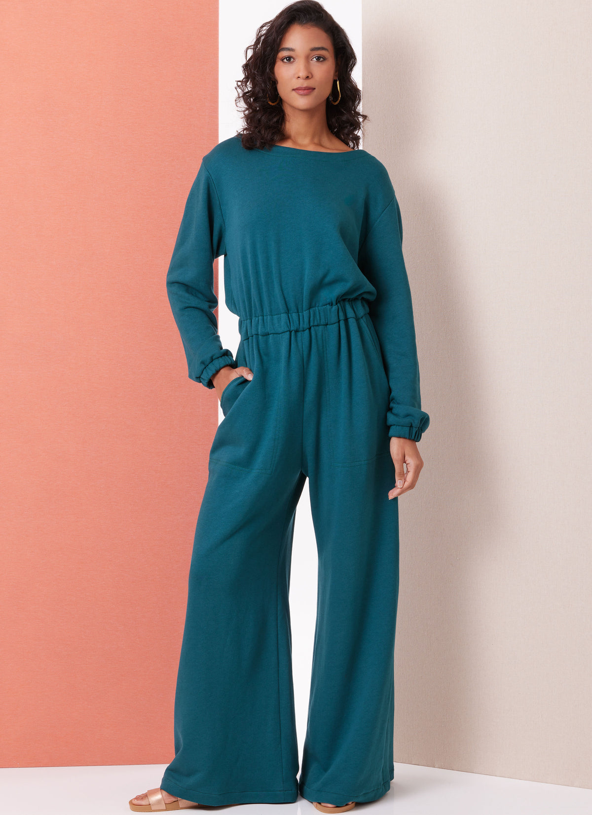 Butterick B7063 sewing pattern envelope showing open back knit jumpsuit designs