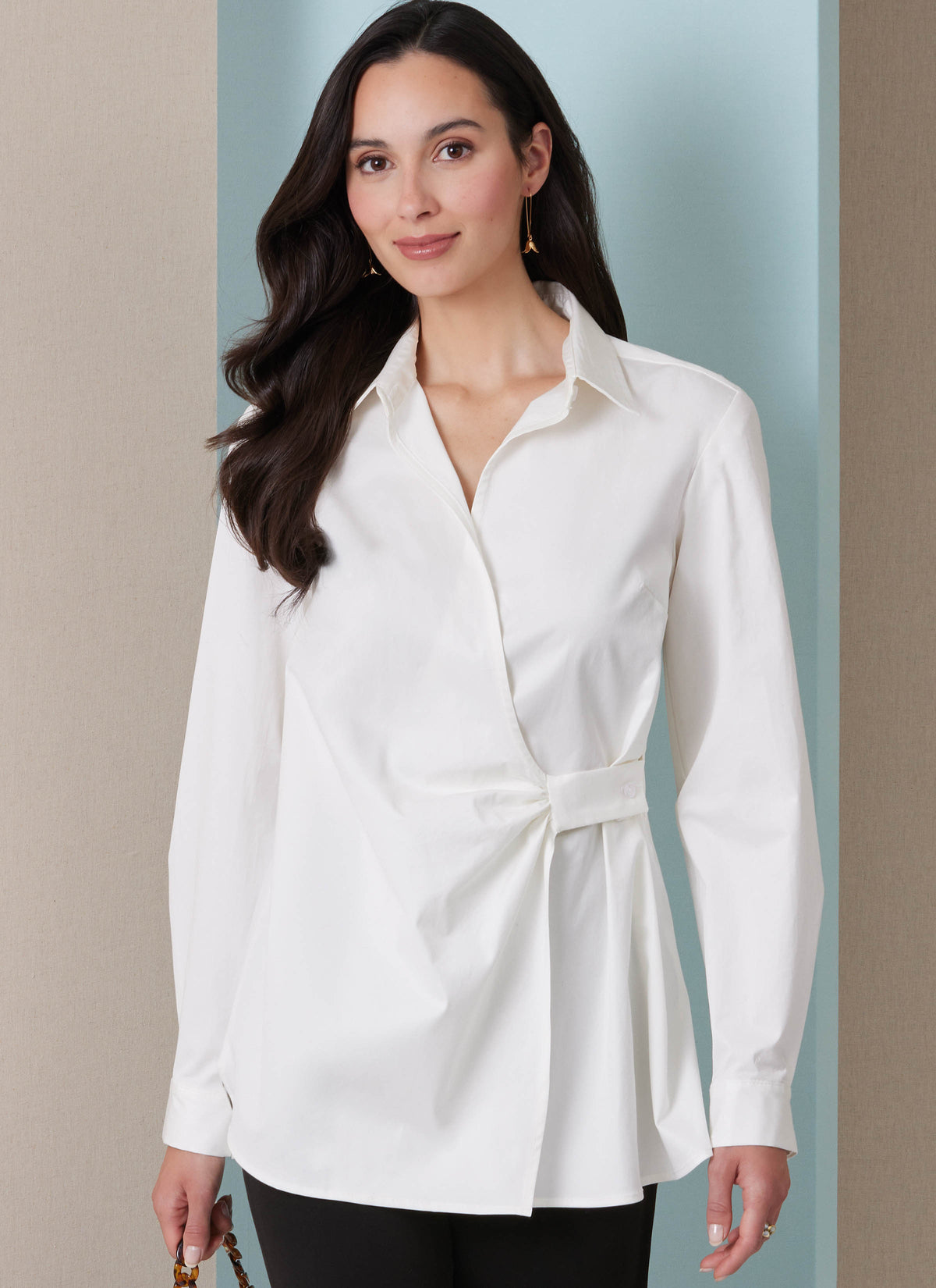 Butterick B7079 sewing pattern envelope showing a loose-fitting asymmetric wrap top